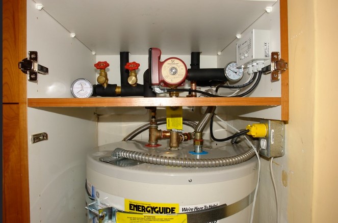 courtesy https://www.flickr.com/photos/rjl20/294102918/in/photostream/
An RV hot water tank cramped to work on na difficult to replace